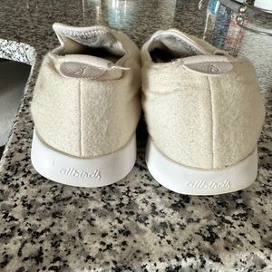 White wool allbirds slip ons